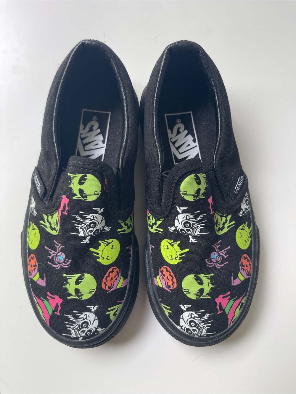 Vans Kids Black Slip-On Sneakers with Neon Spooky Graphics